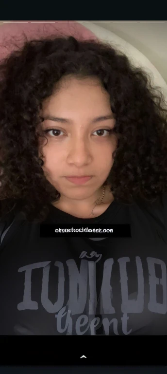 there is a girl with a black bra and a necklace on, curly haired, curly, curly hair, curly afro, curly dark hair, her face framed with curls, curly long hair, curly bangs, fair curly hair, curly black hair, black curly hair, long dark curly hair, messy curly hair, no makeup wavy hair, long curly hair, long black curly hair, Big tits, huge tits , no clothes, sexy, cute, minimal clothes, thick, bbw, chubby stomach, thick nipples, nipple piercings, large areola, hard nipples, piercing through shirt, nipples hard through shirt, busty, major cleavage, naked, ripping through top, spilling over sides, bra too tight, giant , extra wide hips, upper body zoom in, showing off huge , fat stomach, see through top, fat bbw, large areola showing, major cleavage, latina, down to stomach, wide hips, sexy, upper body zoom, thick arm, showing off , top half only, showing only upper, only a bra, showing off cleavage, naked, big tits showing, big out, no clothes