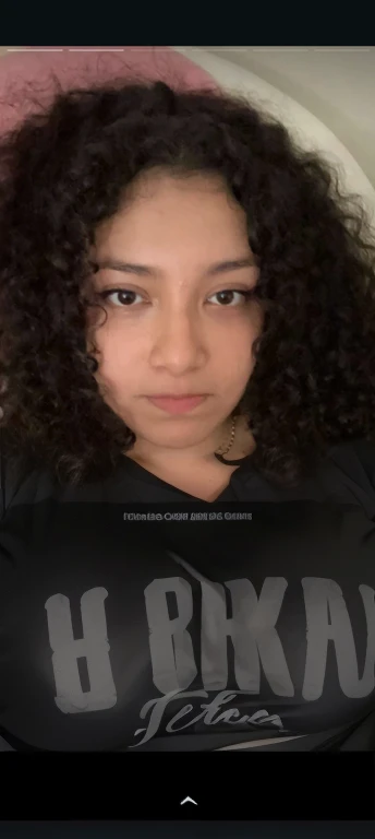 there is a girl with a black bra and a necklace on, curly haired, curly, curly hair, curly afro, curly dark hair, her face framed with curls, curly long hair, curly bangs, fair curly hair, curly black hair, black curly hair, long dark curly hair, messy curly hair, no makeup wavy hair, long curly hair, long black curly hair, Big tits, huge tits , no clothes, sexy, cute, minimal clothes, thick, bbw, chubby stomach, thick nipples, nipple piercings, large areola, hard nipples, piercing through shirt, nipples hard through shirt, busty, major cleavage, naked, ripping through top, spilling over sides, bra too tight, giant , extra wide hips, upper body zoom in, showing off huge , fat stomach, see through top, fat bbw, large areola showing, major cleavage, latina, down to stomach, wide hips, sexy, upper body zoom, thick arm, showing off , top half only, showing only upper, only a bra, showing off cleavage, naked, big tits showing, big cleavage out, no clothes