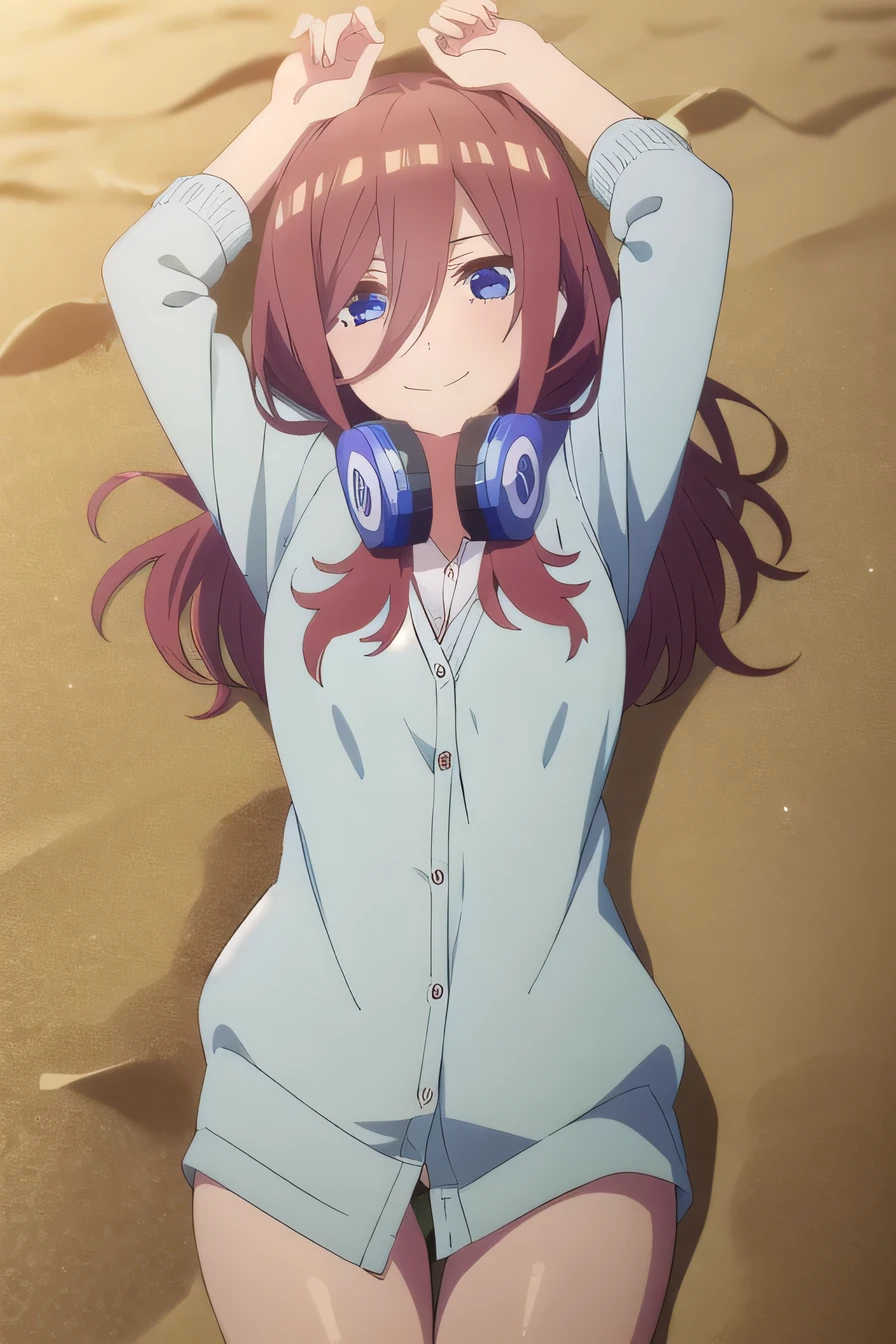 solo, 1girl, looking at viewer, 2D, anime, anime coloring, miku nakano, cardigan, headphones around neck, solo, lying, on back, on sand, arms up, spread arms, looking at viewer, smile, (cowboy shot:1.5)