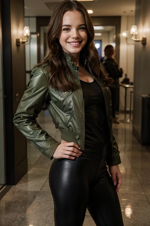 Danielle Panabaker dressed in a military style jacket with tight leggings smiling