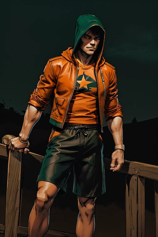 Man darkened face cap and Long long shorts with sachets on the sides and converse sneakers Heroic Presence Serious and strong pose Regular orange T-shirt. On top leather jacket with hood and rolled up sleeves green only and only the jacket 