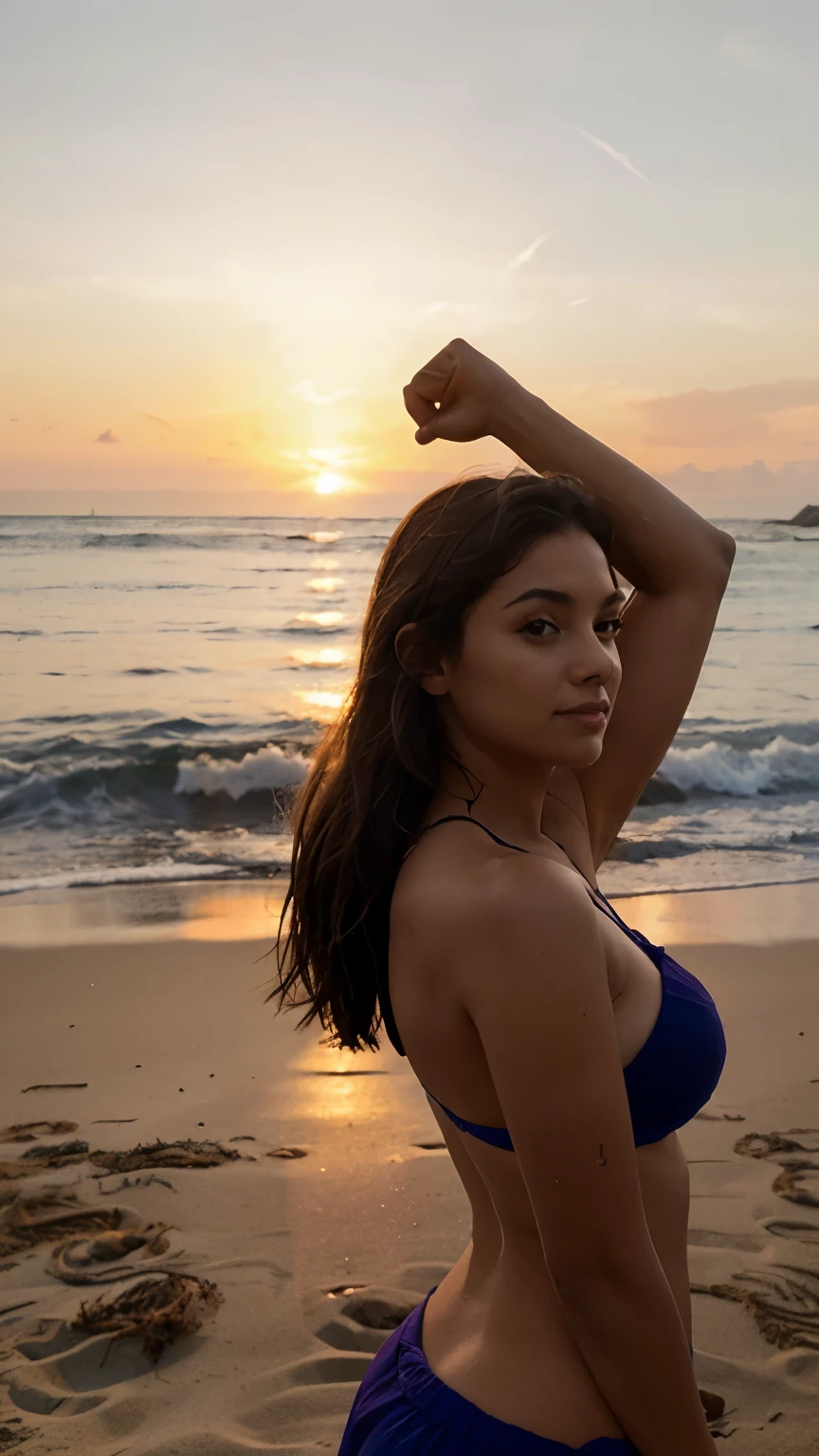 Woman enjoying the sunset on the beach