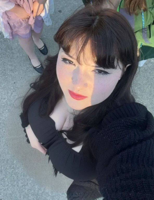 araffe woman with long black hair and red lipstick looking up at the camera, pale goth beauty, profile picture, very pale skin, profile image, goth girl aesthetic, very very very pale white skin, pale fair skin!!, very very pale white skin, very very low quality picture, very pale white skin, pale ivory skin, goth girl, Big tits, huge tits, from above, major cleavage, cleavage showing, deep cleavage, low cut shirt, deep cleavage
