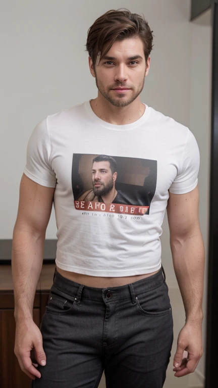 A very handsome, white man with a well-groomed beard and long medium hair stands, looking off to the side of the camera. He exudes confidence and charm, wearing a fitted t-shirt that highlights his attractive and sexy physique. The image captures his smart and alluring presence, making him the center of attention
