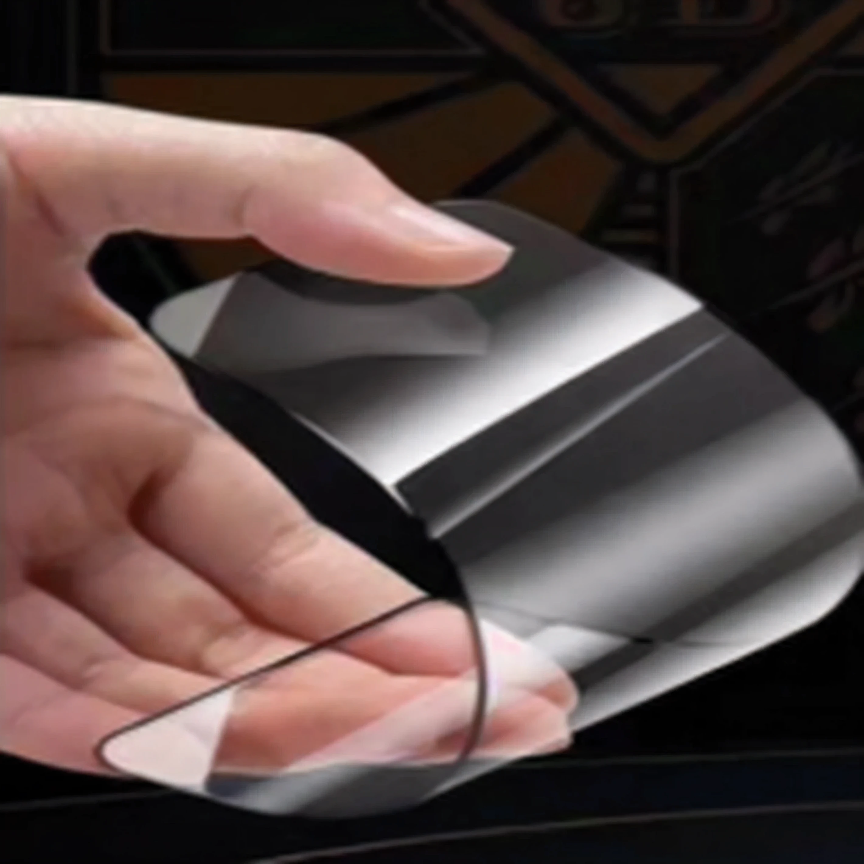 someone is holding a piece of glass in their hand, glass oled visor head, glass oled mecha visor, visor screen for face, transparent black windshield, reflection of phone in visor, glass visor, oled visor for eyes, holographic display lenses, smooth transparent visor, ultra clear material, phone!! held up to visor, reflection of iphone in visor