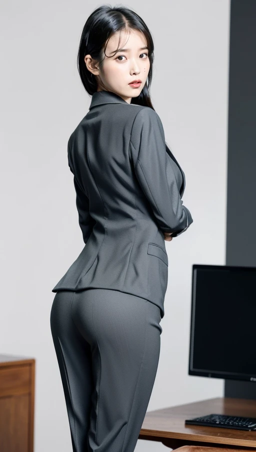 (Best quality, 8k, 32k, Masterpiece, UHD:1.2), 1girl, beautiy Japanese woman, narrow waist, grey suit, open jacket, office lady, suit, pants, from behind, office room, desk, (stick out one's buttocks:1.2), detailed face, short hair, from below, raise one leg