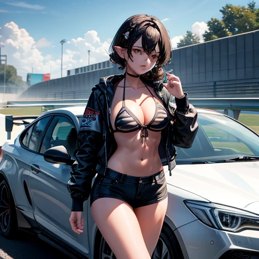 A woman in a black bikini and racing shorts
