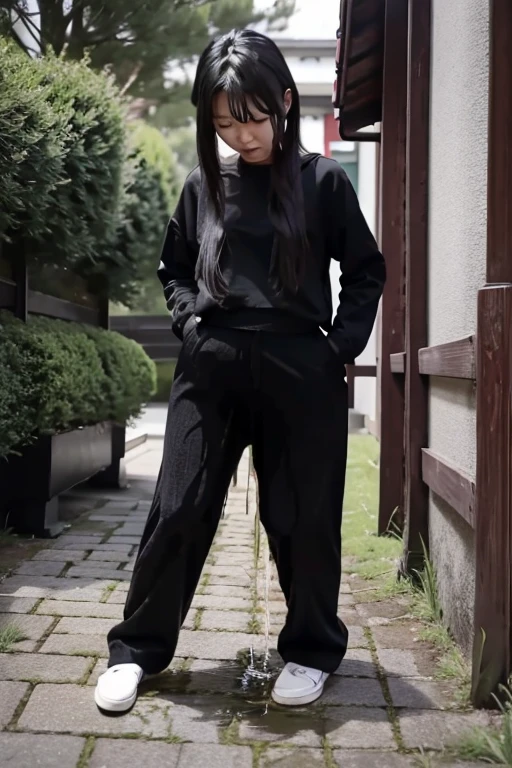 Japanese Girl sees the ghost and pees her black palazzo pants until her pants are wet in fright.