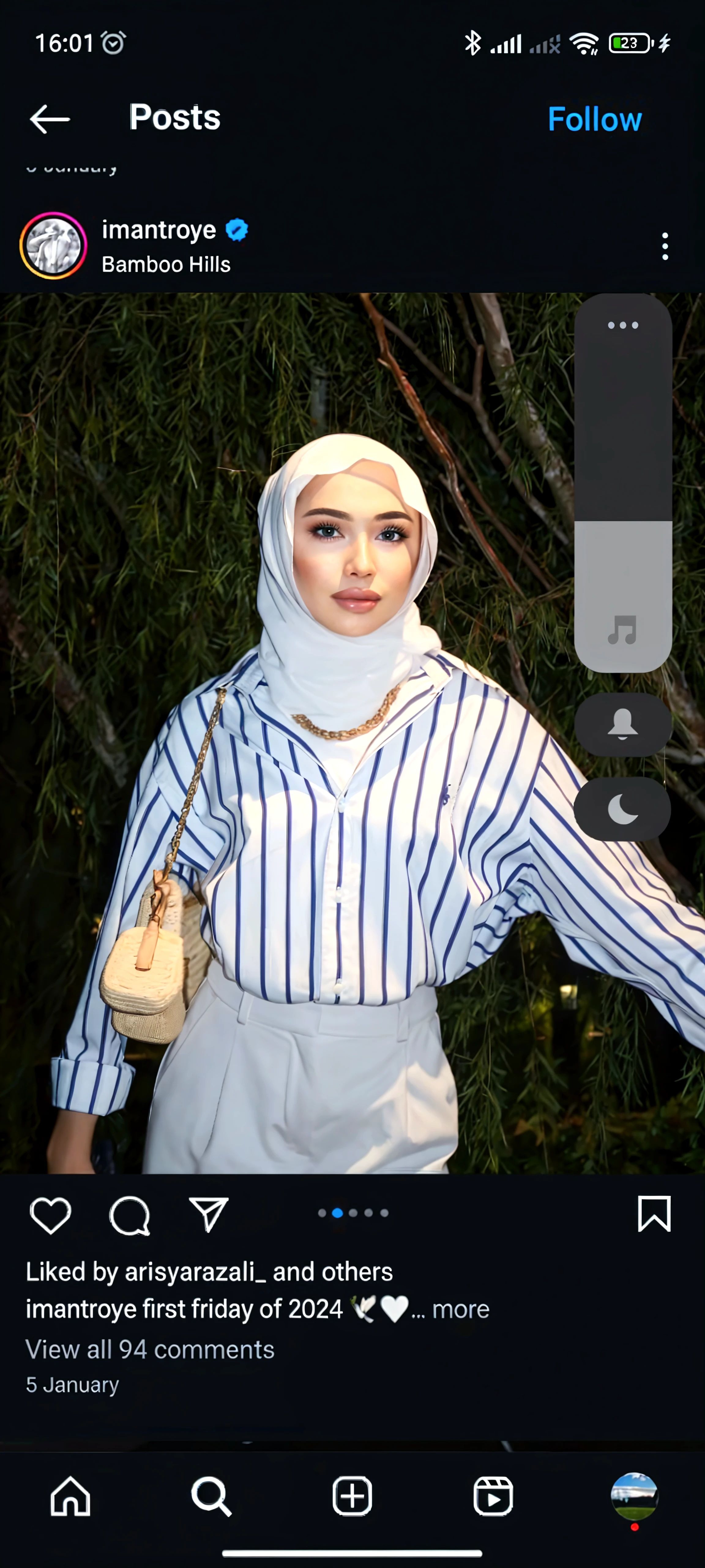 Malay girl wear white hijab, wear pastel big modest gold floral oversized Turtle Neck Tee & high waist pants, she with two friends in bustop, smiling, wear gold necklace, front view, hijab blown, windy, detail skin, age spot, detail skin texture, mole below eyes, small breast, flat chest, wide hips, small waists, thick thighs, slim abs, beautiful body, morning, laughing, happy, bright lighting, people in background, city background, blur background, bokeh, location: busstop