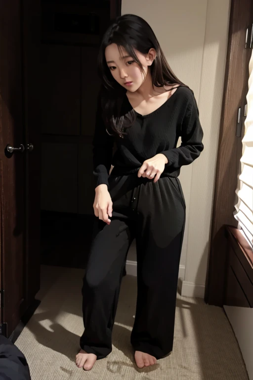 Japanese Girl sees the ghost and pees her black palazzo pants until her pants are wet in fright.