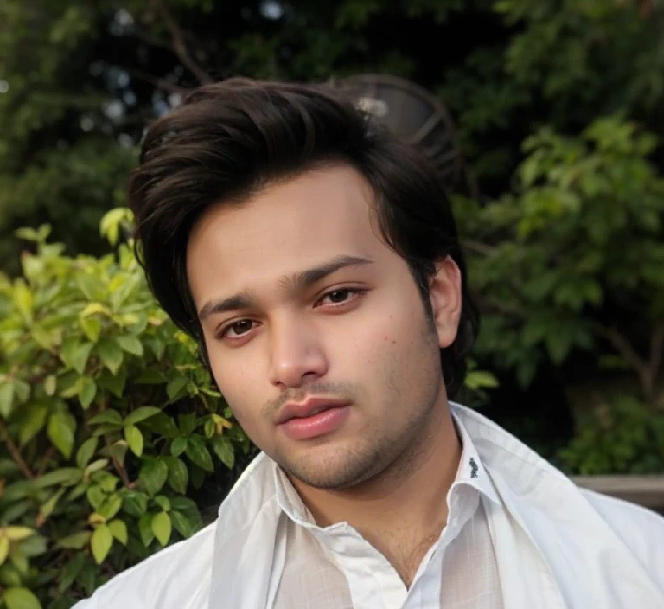 A beautiful young bearded man with highly detailed skin.