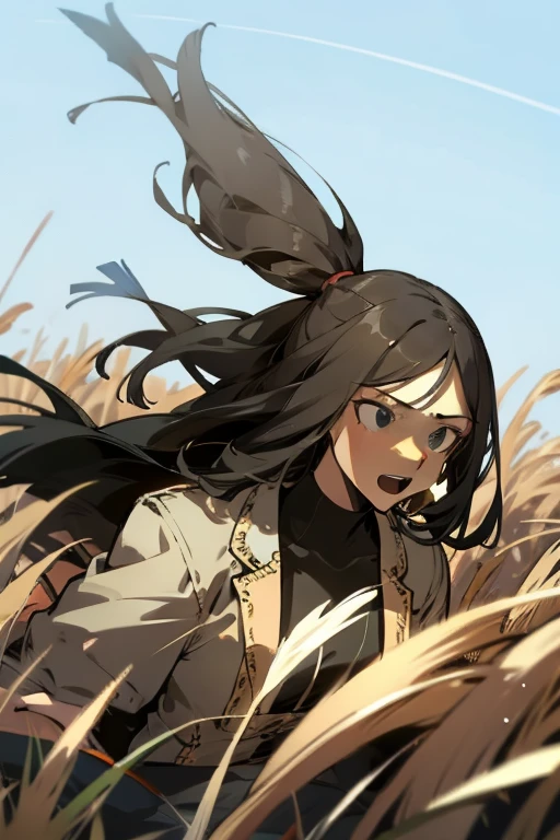 Woman in a field with expression of determination