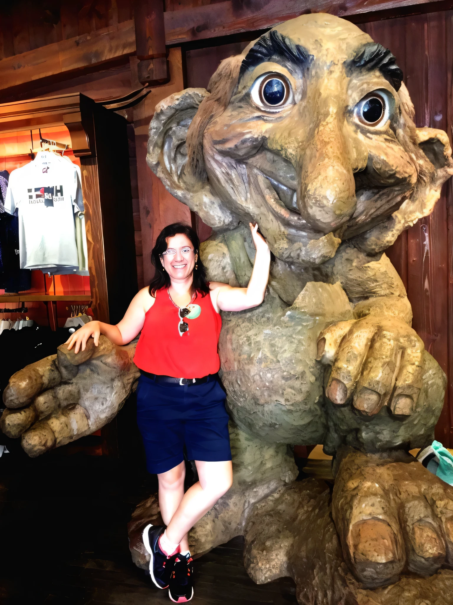 arafed woman posing with a giant statue of a trolly, giant clay statue, troll, monster statues, posing like a statue, in disney, gigantic titan winnie the pooh, ginormous, very silly looking, it's very huge, cuddling her gremlings, trolls, with a figure in the background, with magical creatures, full-figure