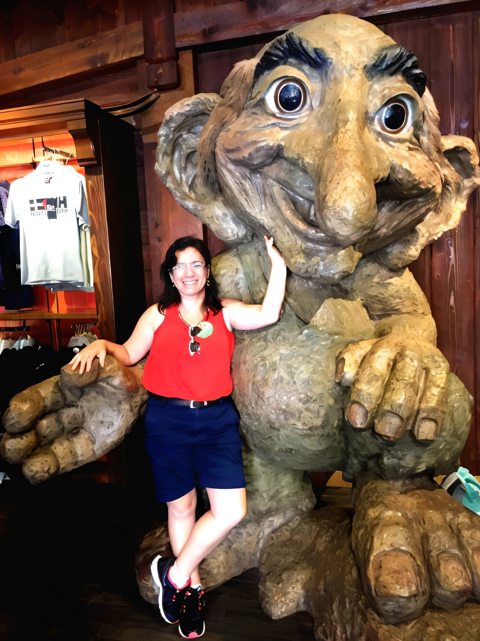 arafed woman posing with a giant statue of a trolly, giant clay statue, troll, monster statues, posing like a statue, in disney, gigantic titan winnie the pooh, ginormous, very silly looking, it's very huge, cuddling her gremlings, trolls, with a figure in the background, with magical creatures, full-figure