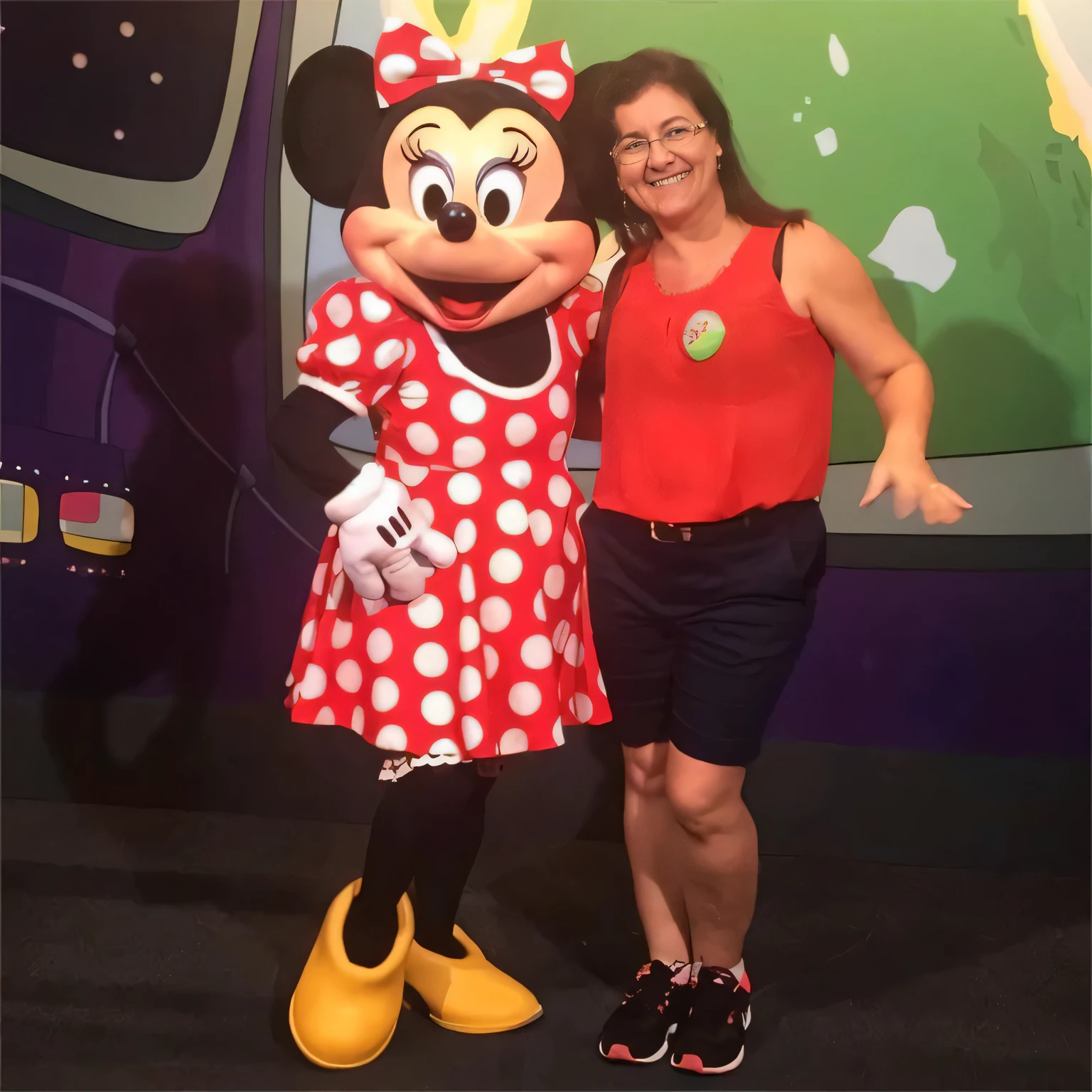 minnie mouse and a woman pose for a picture in front of a mickey mouse, minnie mouse, disney 8 k photo, photo taken in 2 0 2 0, usa-sep 20, photo taken in 2018, epcot, at california adventure, disney artist, by Tom Wänerstrand, 4 5 yo, disney character, pose 1 of 1 6