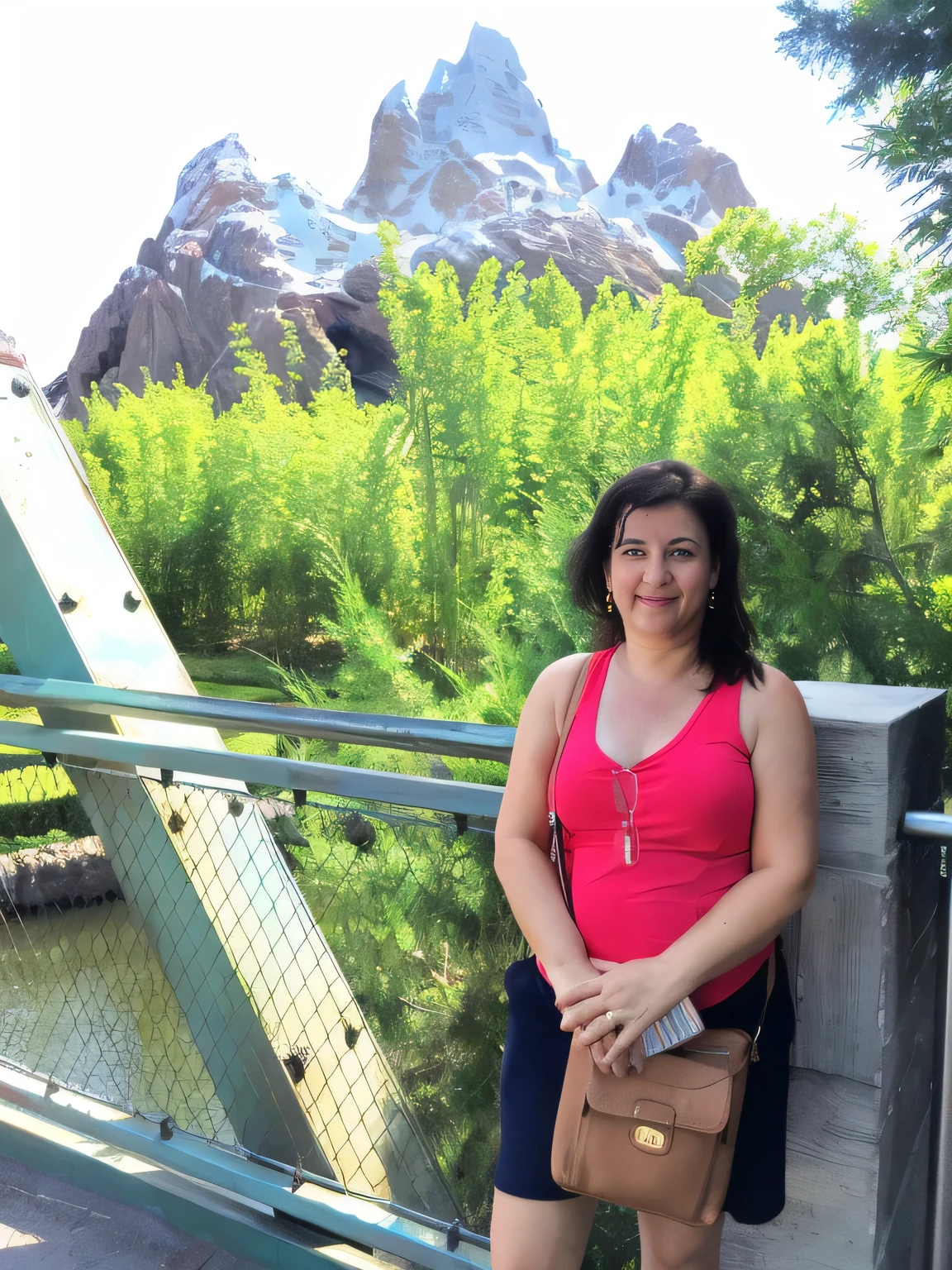 woman standing on a bridge with a mountain in the background, animal kingdom, with mountains in the background, with mountains as background, with mountains in background, usa-sep 20, photo taken in 2 0 2 0, at california adventure, disneyland as backdrop, moutain in background, with a volcano in the background, vacation photo, mountains in the background