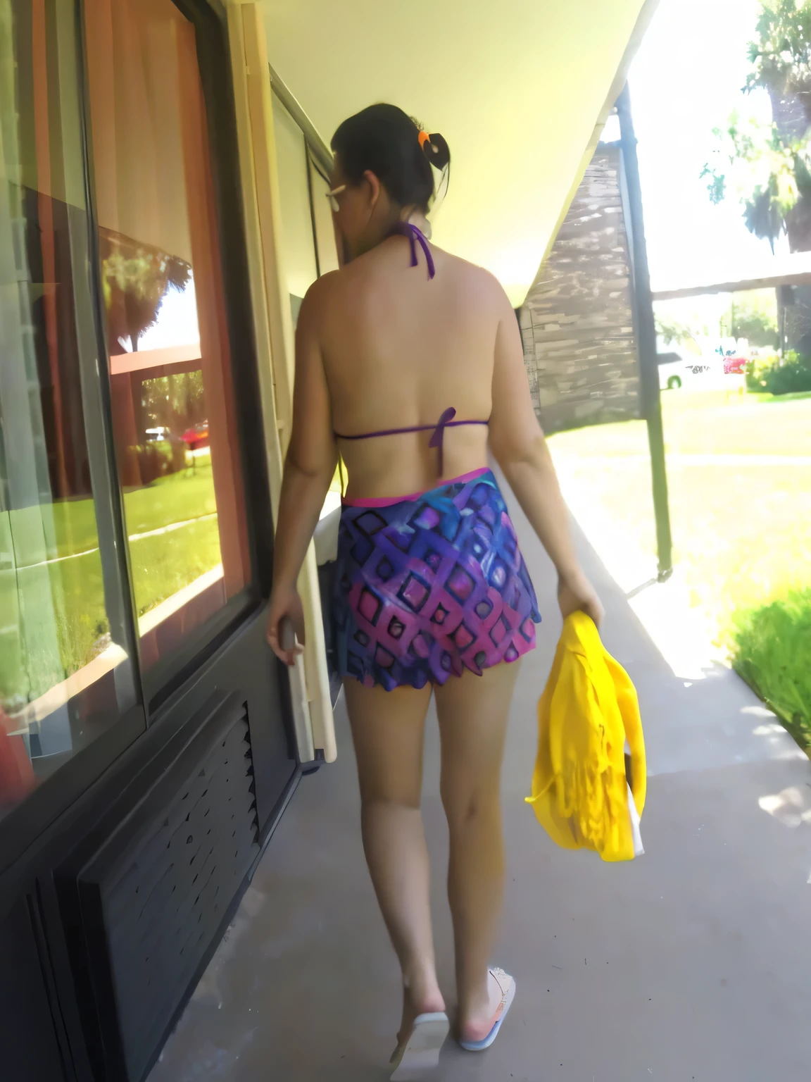 araffe woman in a bikini top and shorts walking down a sidewalk, next to a pool, backview, backshot, bathing suit, rear-shot, rear shot, side shot, rear view, is wearing a swimsuit, back shot, seen from behind, walking away from camera, seen from the back, aztec bathing suit, wearing pearl neon bikini