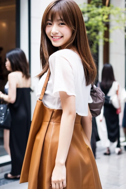 Japanese girl with brown hair dressed in fashion designer clothes and a sexy smile.
