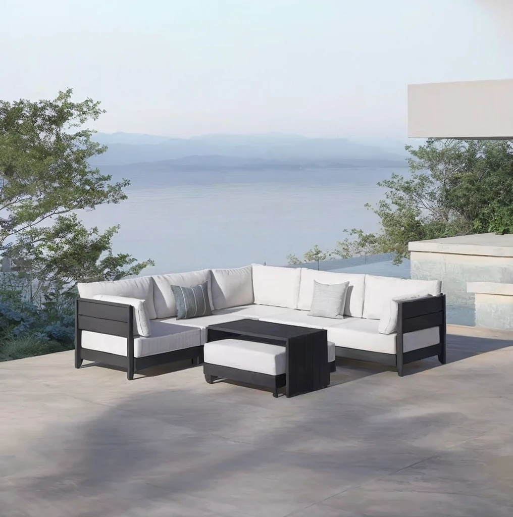 In the backyard scene, there are furniture under the pavilion, including sofa, coffee table pillow and potted plants.Keep the sofa, cancel the original background and redraw the background according to this style.
