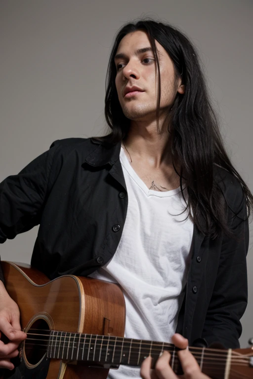 Handsome thin White man  goth long black hair male playing guitar 