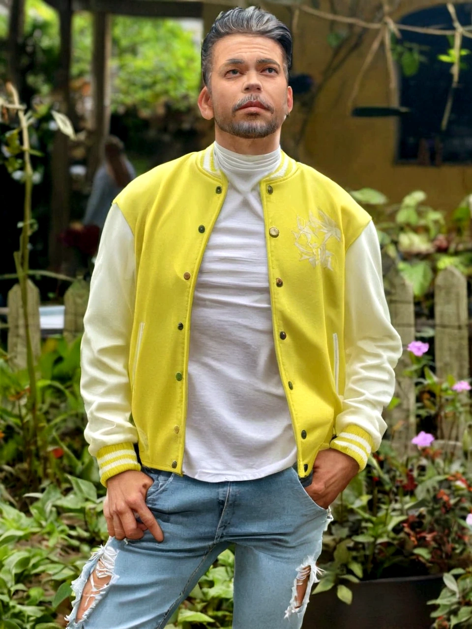 araffe man in a yellow jacket and jeans standing in a garden, roupas amarelas, em uma tela amarela, with white kanji badges, desgastando - estilo branco, rei de amarelo, com panos amarelos, simetria!! guarda florestal amarelo, tirada em 2 0 2 0, taken at the beginning of 2020, altamente realista