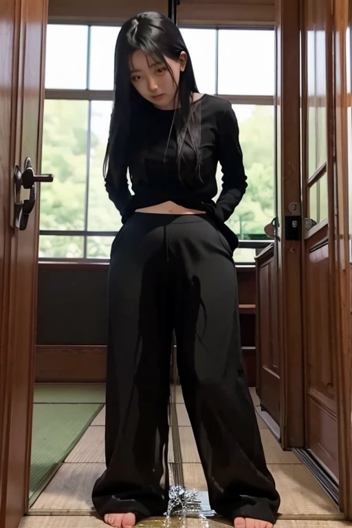 Japanese Girl sees the ghost and pees her black palazzo pants until her pants are wet in fright.