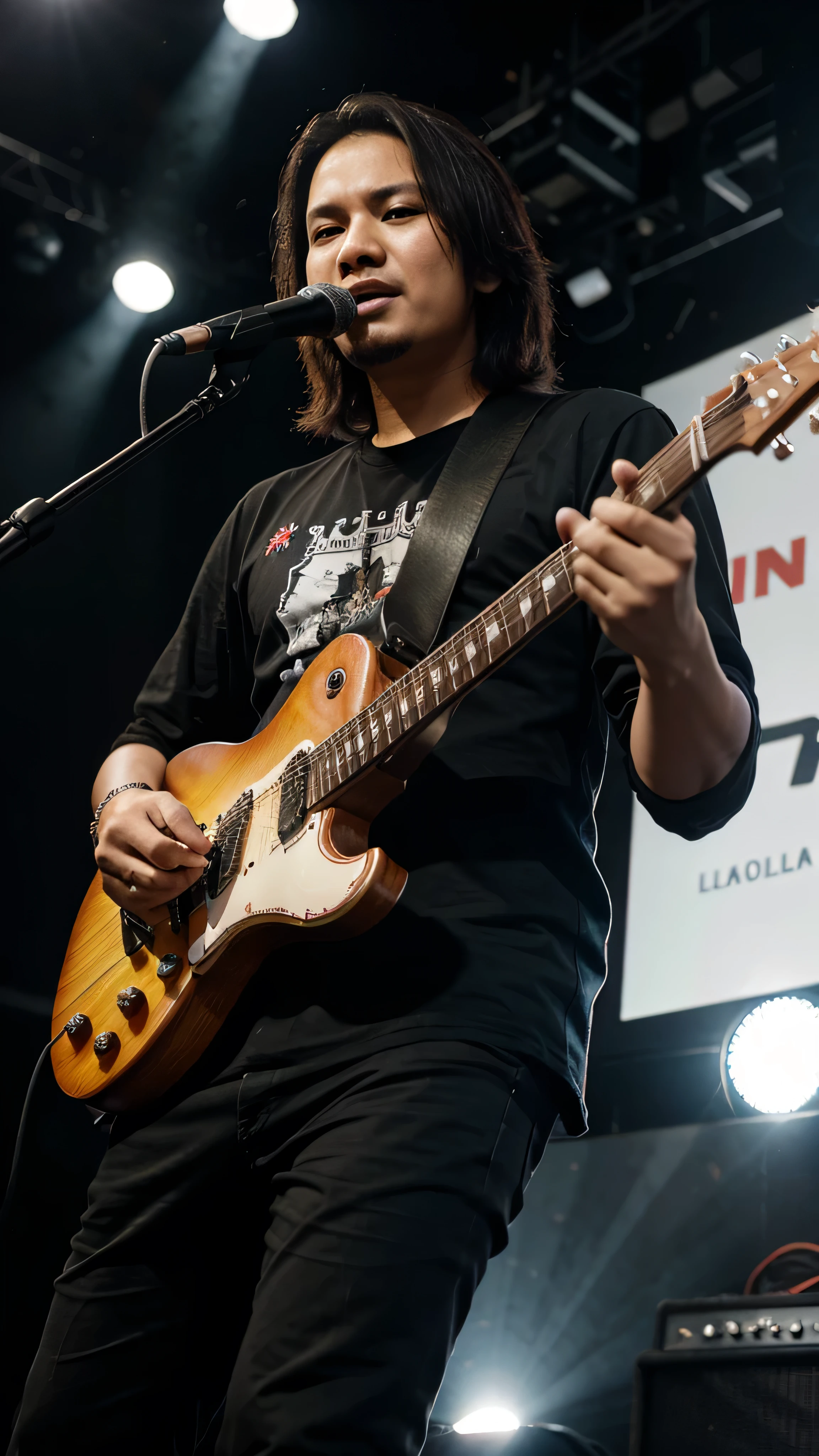 Iwan Xaverius, guitaris band Indonesian, action stage