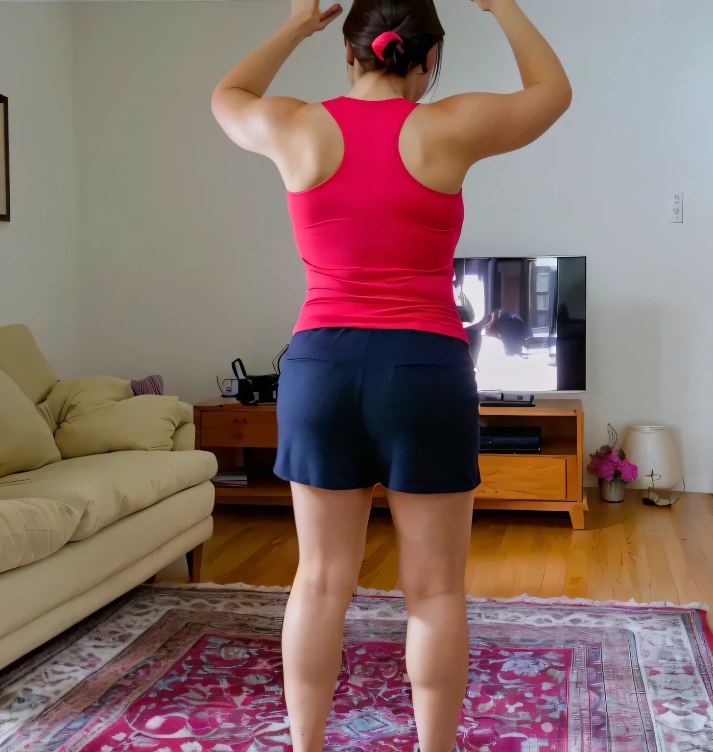 In a cozy living room, a woman stands with her arms raised in the air, as if she is dancing or playing with an invisible object. She's wearing a vibrant red tank top and blue shorts, adding a pop of color to the scene. Behind her, a television is off, reflecting the warm light of the room. A comfortable sofa sits against the wall, inviting you to relax. The floor beneath her feet is covered in a patterned rug that adds texture to the space.
A beautiful woman, with white skin and dark brown hair. She is about 45 years old, 165 cm tall and weighs 56 kg. She has a perfect mouth, medium breasts, a perfect face. Her body exudes glamor and her face is a definition of beauty. Slender body, thin waist. Highly realistic, hyperrealism, very elaborate skin. Clear photo, high resolution, high quality, masterpiece, 16K photo, high contrast, masterpiece, NUDE, NUDITY, NFSW.