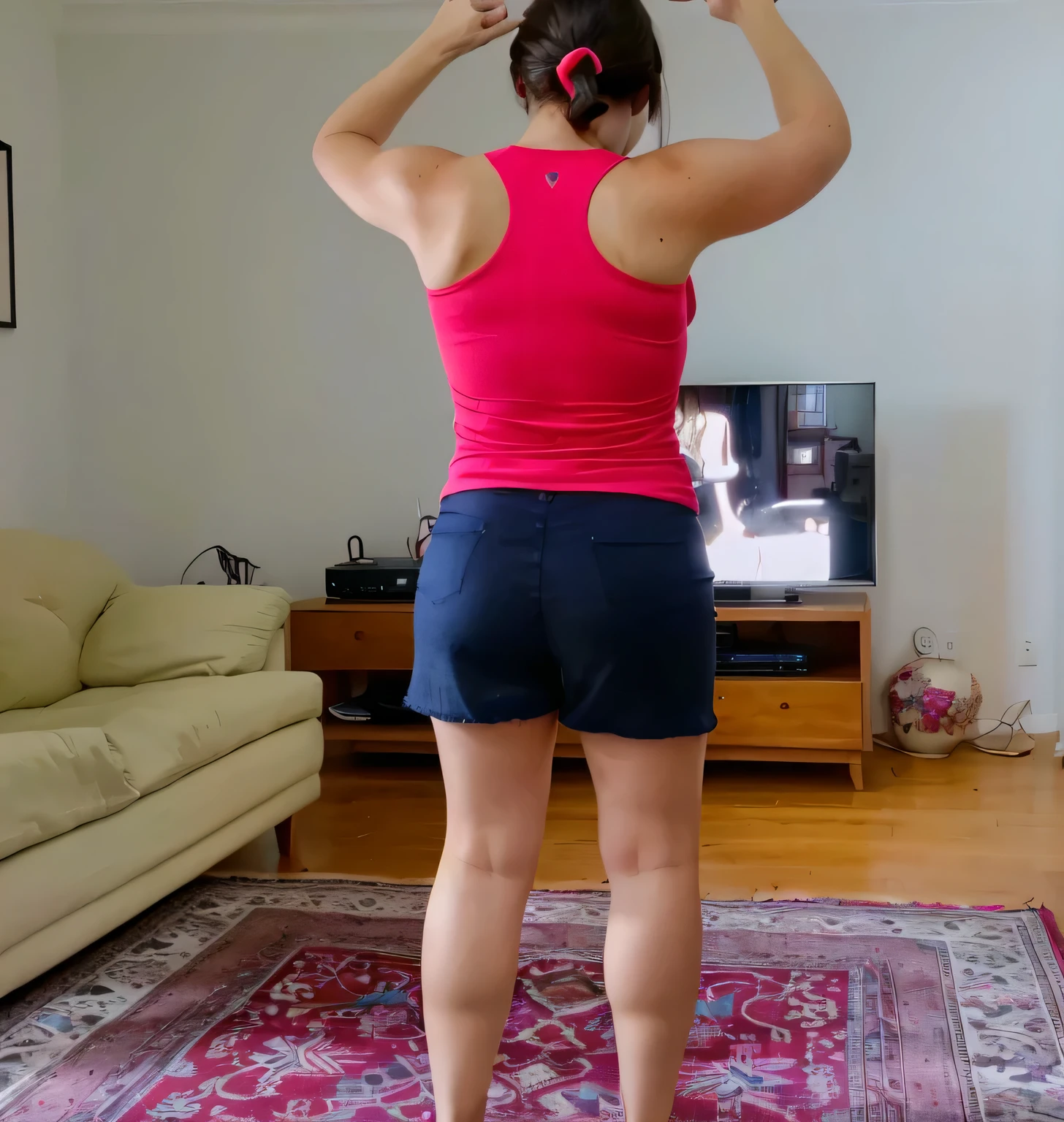 In a cozy living room, a woman stands with her arms raised in the air, as if she is dancing or playing with an invisible object. She's wearing a vibrant red tank top and blue shorts, adding a pop of color to the scene. Behind her, a television is off, reflecting the warm light of the room. A comfortable sofa sits against the wall, inviting you to relax. The floor beneath her feet is covered in a patterned rug that adds texture to the space.
A beautiful woman, with white skin and dark brown hair. She is about 45 years old, 165 cm tall and weighs 56 kg. She has a perfect mouth, medium breasts, a perfect face. Her body exudes glamor and her face is a definition of beauty. Slender body, thin waist. Highly realistic, hyperrealism, very elaborate skin. Clear photo, high resolution, high quality, masterpiece, 16K photo, high contrast, masterpiece, NUDE, NUDITY, NFSW.