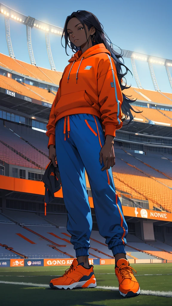A beautiful woman with orange long hair, wearing a blue hoodie, blue jogger pants, and orange Nikes, standing on a football field in a stadium, masterpiece, textured skin, super detailed, high quality, best quality, HD, 16k