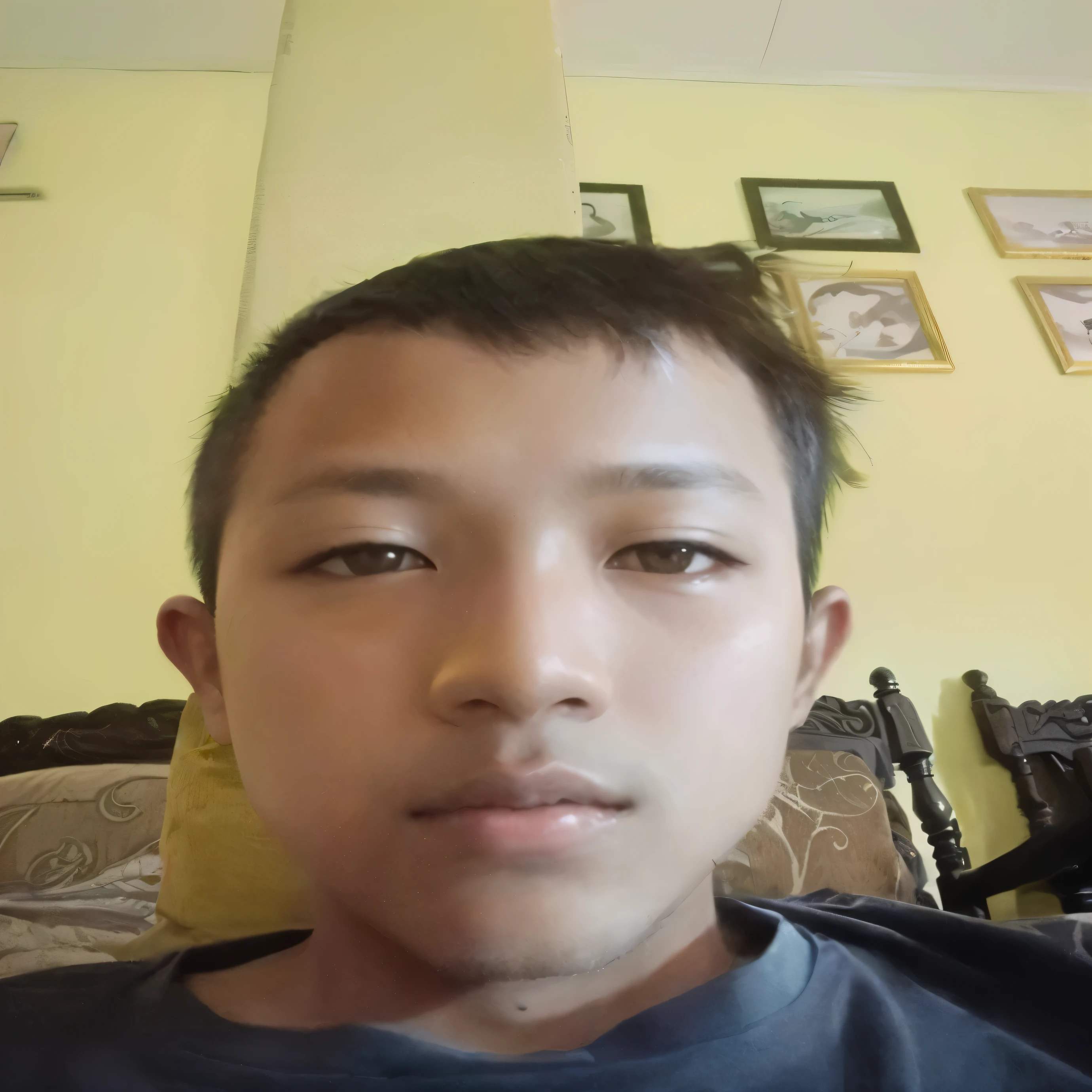 there is a young boy that is sitting on a couch, nivanh chanthara, thawan duchanee, with accurate face, ayan nag, south east asian with round face, 2 3 years old, boy thin face, 2 7 years old, 2 2 years old, yanjun chengt, dang my linh, boy with neutral face