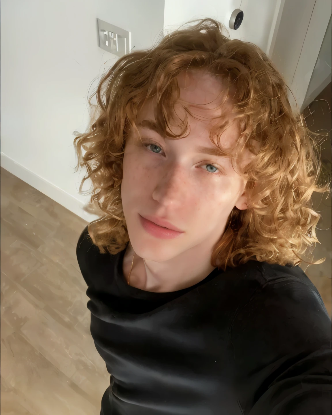 there is a man with curly hair taking a selfie, pale skin curly blond hair, taken in the early 2020s, he has short curly brown hair, curls on top of his head, with curly red hair, curly blonde hair | d & d, leaked image, very very curly blond hair, ginger hair with freckles, halfbody headshot