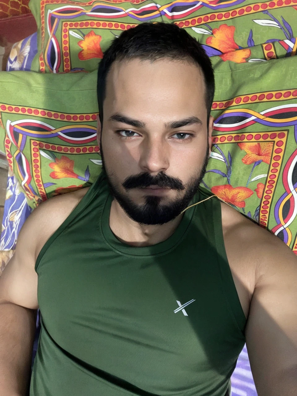 (best quality), (high quality), (detailed), (masterpiece), (absurdres), a portrait of a young man, 1man, looking at the camera, realistic, (cute face:1.2), very handsome, toned, tanned skin, sexy smoulder, sexy expression, flirt, short hair, spiky hair, (wearing very tight camouflage_design_tank_top), jungle, trees, natural sun lighting, photograph, hdr, depth of field, 35mm, dslr shot, canon, f/12, 100 ISO, dynamic lighting, vibrant colors, octane render, 8k, (sharp focus), (beautiful hands:1.2), (detailed fingers:1.2), GS-DeFeminize