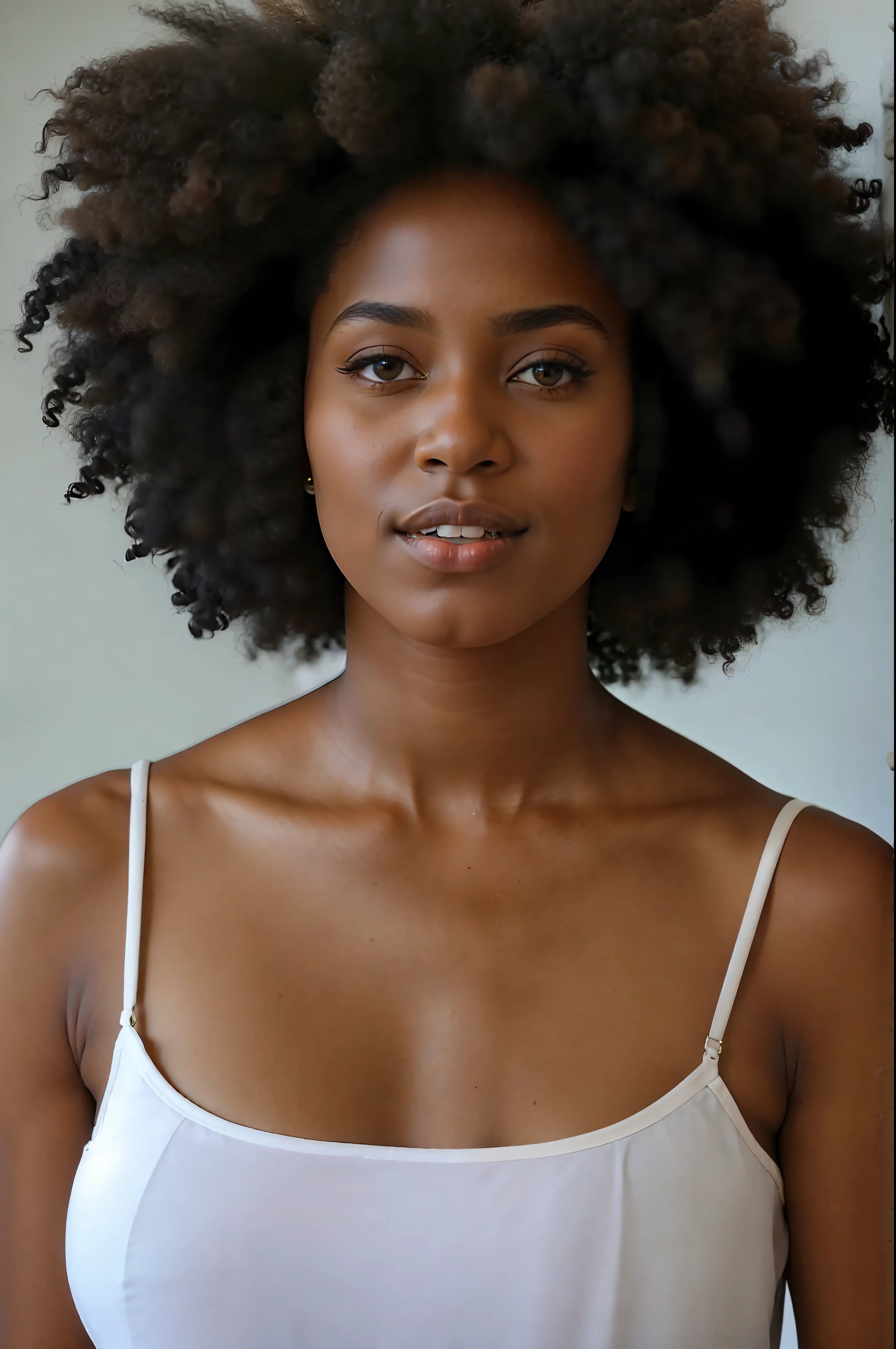 There is a fair-skinned woman with a very large afro standing in front of a wall, natural hair, brown skin, long afro hair, afro, tall afro, fair-skinned African girl, black young woman, dark skin, afro curly, afro hair, with afro, photo of a black woman, mixed-race woman, black woman, olive skin, dark skin