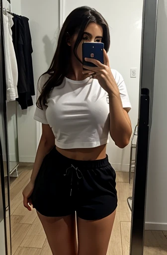 greek young woman standing, selfie, body, ((black shorts)), white long t-shirt, mirror selfie, (facing camera)