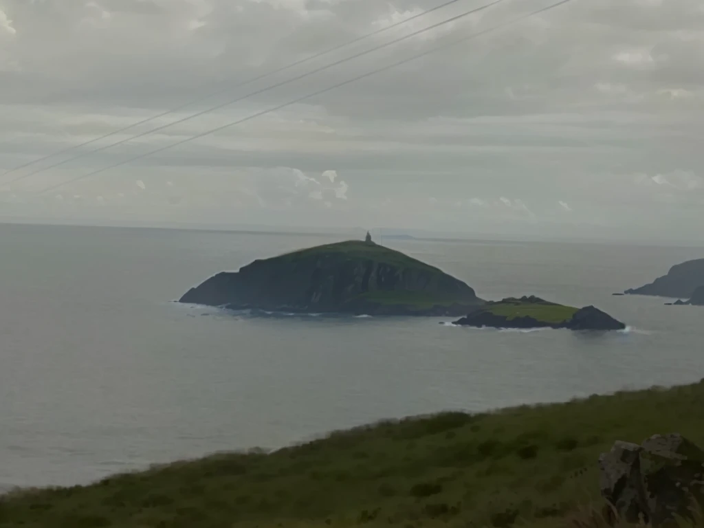 there are two sheep standing on a hill overlooking the ocean, an island, island in the background, in the distance is a rocky hill, viewed from a distance, biggish nose, viewed from very far away, islands!!!!!, zoomed out shot, the photo was taken from afar, zoomed out very far, viewed from bellow, seen from a distance
