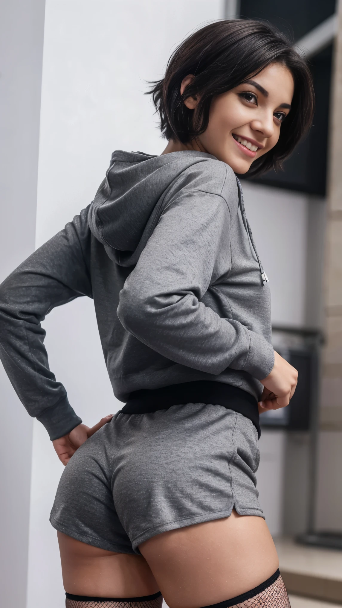 showing her butt to the camera, realistic, detailed natural human body, brunette, black shorts,greek gamer girl with short hair, twitch streamer, sexy pose, wearing fishnets, wearing grey hoodie and hood, smiling to the camera, black shorts, black shorts fit butt