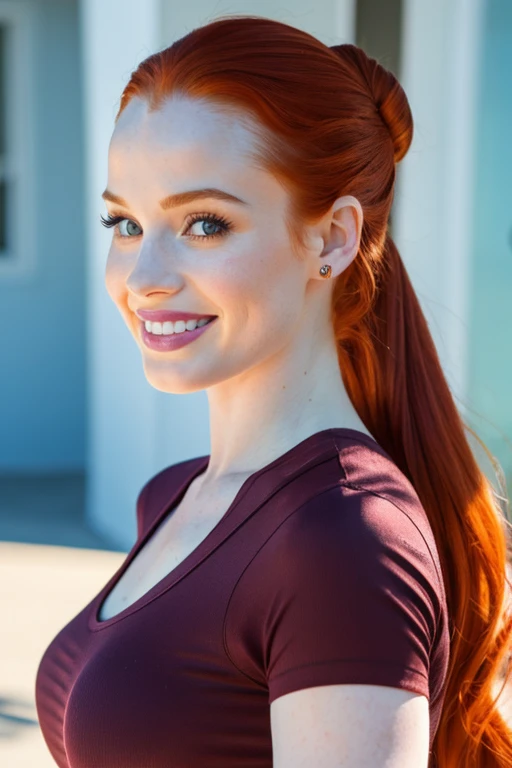 Madelaine Petsch with her hair up dressed in casual, tight clothing on a sunny day and a sexy smile.