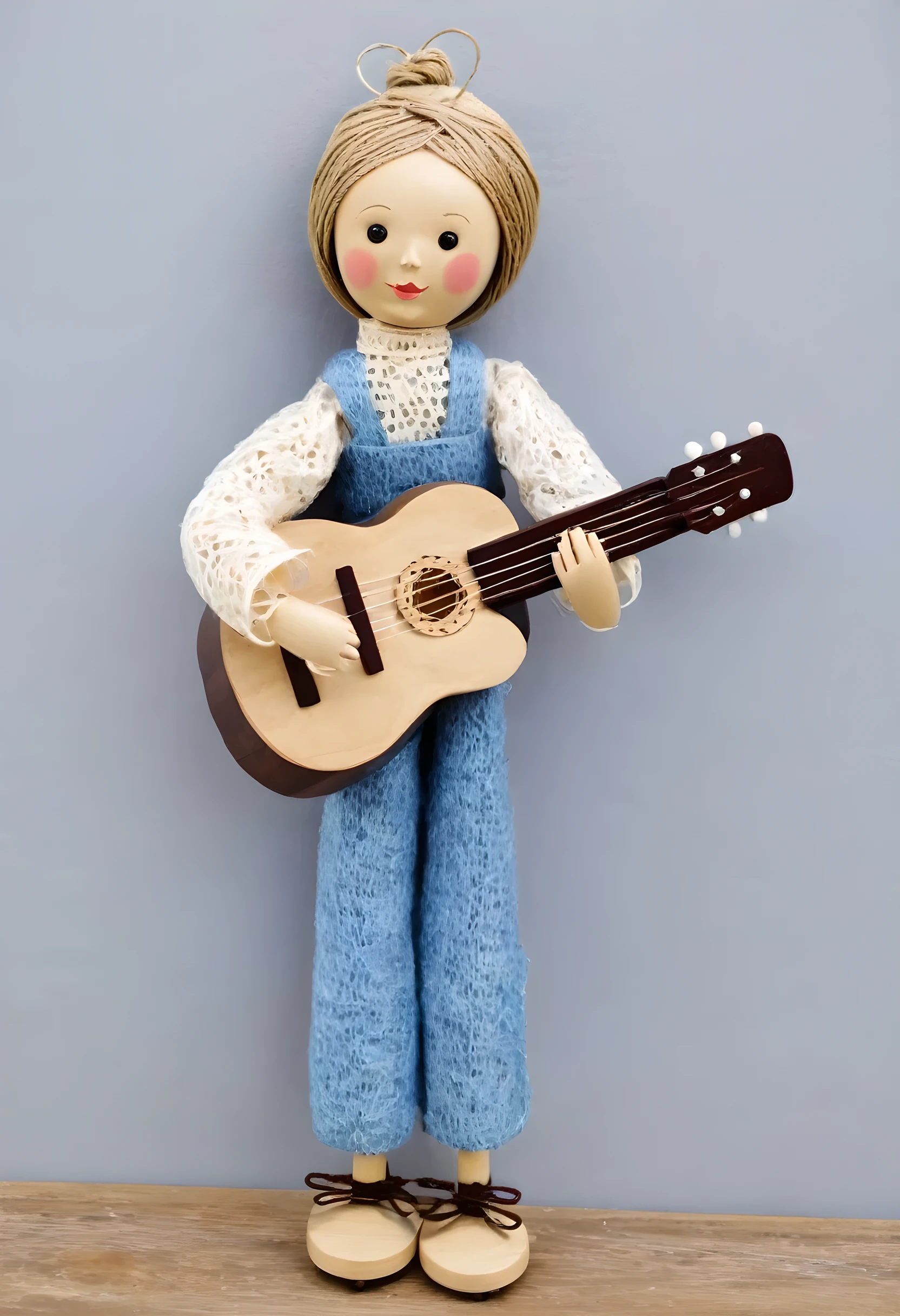Guitarist doll, made of wood and string, children's craft,