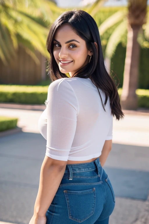 Camila Mendes wearing tight shirt and ripped jeans and smiling sexy