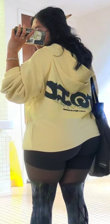 araffe taking a picture of a woman in a yellow hoodie with her ass out, beige hoodie, wearing a yellow hoodie, trending on r/streetwear, hodie mihi cras tibi, hoodie, hoody, 4 0 9 6, in a hoodie, wearing a fisher 🧥, 2020, 2 0 2 0, big ass, huge ass, bbw, from behind, thick, thick thighs, wide hips, bbw, big , sideboob, giant ass, back view, big butt, round butt, tight underwear, underwear halfway off, underwear taking off, grabbing ass, ass spilling over underwear, too thick for clothes, looking left, leftwards, naked, no clothes, no pants, naked