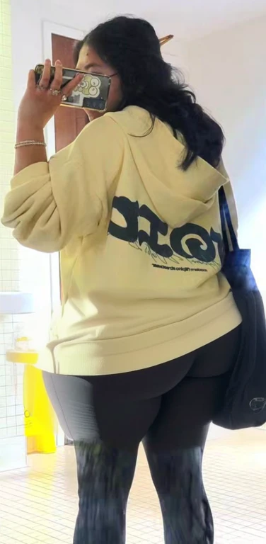 araffe taking a picture of a woman in a yellow hoodie with her ass out, beige hoodie, wearing a yellow hoodie, trending on r/streetwear, hodie mihi cras tibi, hoodie, hoody, 4 0 9 6, in a hoodie, wearing a fisher 🧥, 2020, 2 0 2 0, big ass, huge ass, bbw, from behind, thick, thick thighs, wide hips, bbw, big , sideboob, giant ass, back view, big butt, round butt, tight underwear, underwear halfway off, underwear taking off, grabbing ass, ass spilling over underwear, too thick for clothes, looking left, leftwards, naked, no clothes, no pants, naked