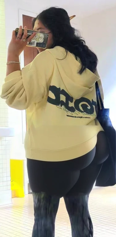 araffe taking a picture of a woman in a yellow hoodie with her ass out, beige hoodie, wearing a yellow hoodie, trending on r/streetwear, hodie mihi cras tibi, hoodie, hoody, 4 0 9 6, in a hoodie, wearing a fisher 🧥, 2020, 2 0 2 0, big ass, huge ass, bbw, from behind, thick, thick thighs, wide hips, bbw, big , sideboob, giant ass, back view, big butt, round butt, tight underwear, underwear halfway off, underwear taking off, grabbing ass, ass spilling over underwear, too thick for clothes, looking left, leftwards, naked, no clothes, no pants, naked, ass is uncovered