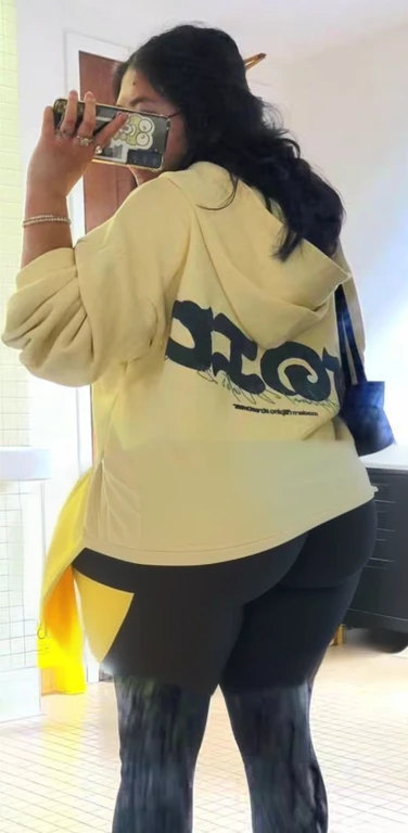 araffe taking a picture of a woman in a yellow hoodie with her ass out, beige hoodie, wearing a yellow hoodie, trending on r/streetwear, hodie mihi cras tibi, hoodie, hoody, 4 0 9 6, in a hoodie, wearing a fisher 🧥, 2020, 2 0 2 0, big ass, huge ass, bbw, from behind, thick, thick thighs, wide hips, bbw, big , sideboob, giant ass, back view, big butt, round butt, tight underwear, filipina underwear halfway off, underwear taking off, grabbing ass, ass spilling over underwear, too thick for clothes, looking left, leftwards, naked, no clothes, no pants, naked, ass is uncovered