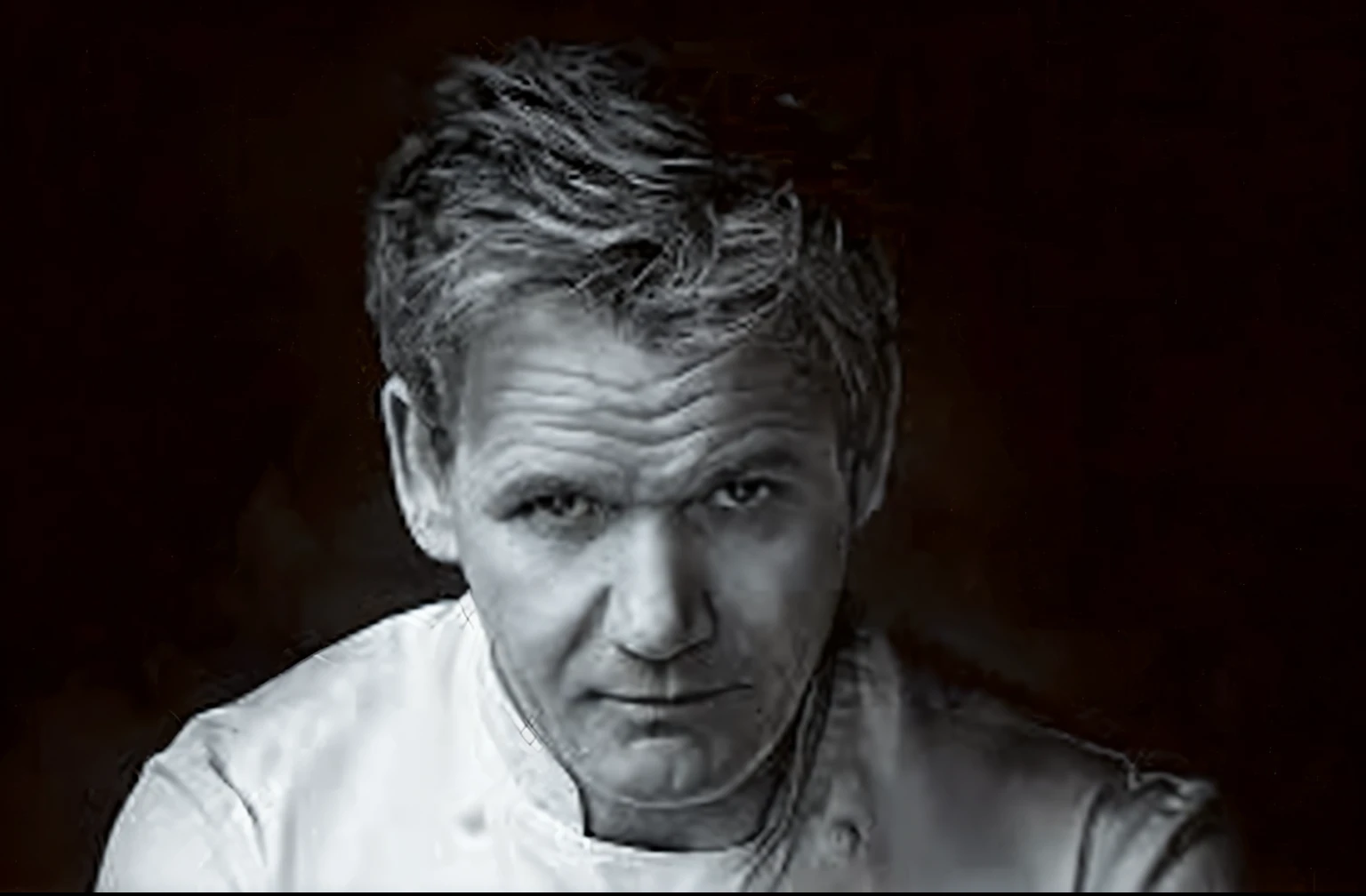 A high-quality portrait of chef Gordon Ramsay, black and white, intense facial expression, dramatic lighting, chiaroscuro, cinematic, powerful, moody, brooding, photorealistic, 8K, hyperrealistic, masterpiece