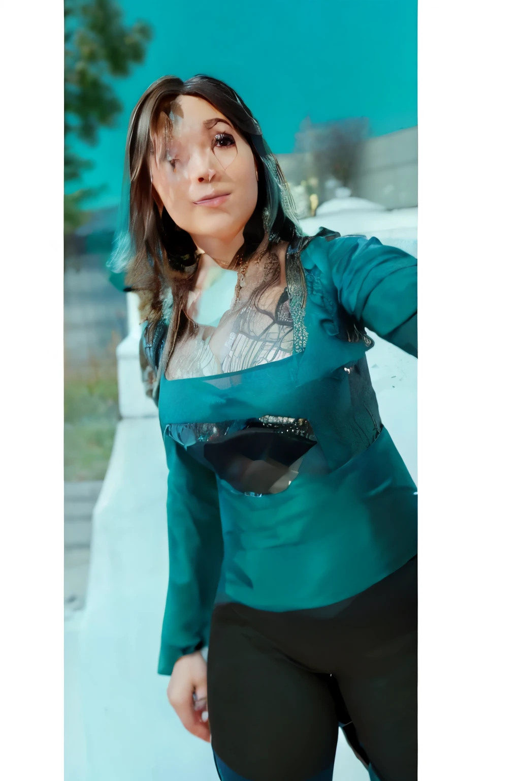 A young woman with light brown skin and dark brown hair, Cleavage on the breasts with transparent fabric on top, leggins black, taking a selfie in natural daylight. She is wearing a teal long-sleeve shirt with a lace pattern on the upper chest area, and black pants. The background shows a blurred outdoor scene with trees and a clear blue sky. The woman has a gentle smile and a relaxed pose, with her hair slightly tousled. The image is extremely detailed, photorealistic, and high-resolution, capturing the natural lighting, smooth skin texture, and vibrant colors. The focus is on the woman's face and upper body, showcasing her natural beauty and the intricate details of her clothing and surroundings. ((extremely detailed)), ((realistic)), ((photorealistic)), ((high-resolution 8K)), ((natural lighting)), ((smooth skin texture)), ((sharp focus)), ((realistic proportions)), ((accurate facial features)), ((vivid colors)), ((elegant composition)), ((captivating expression))