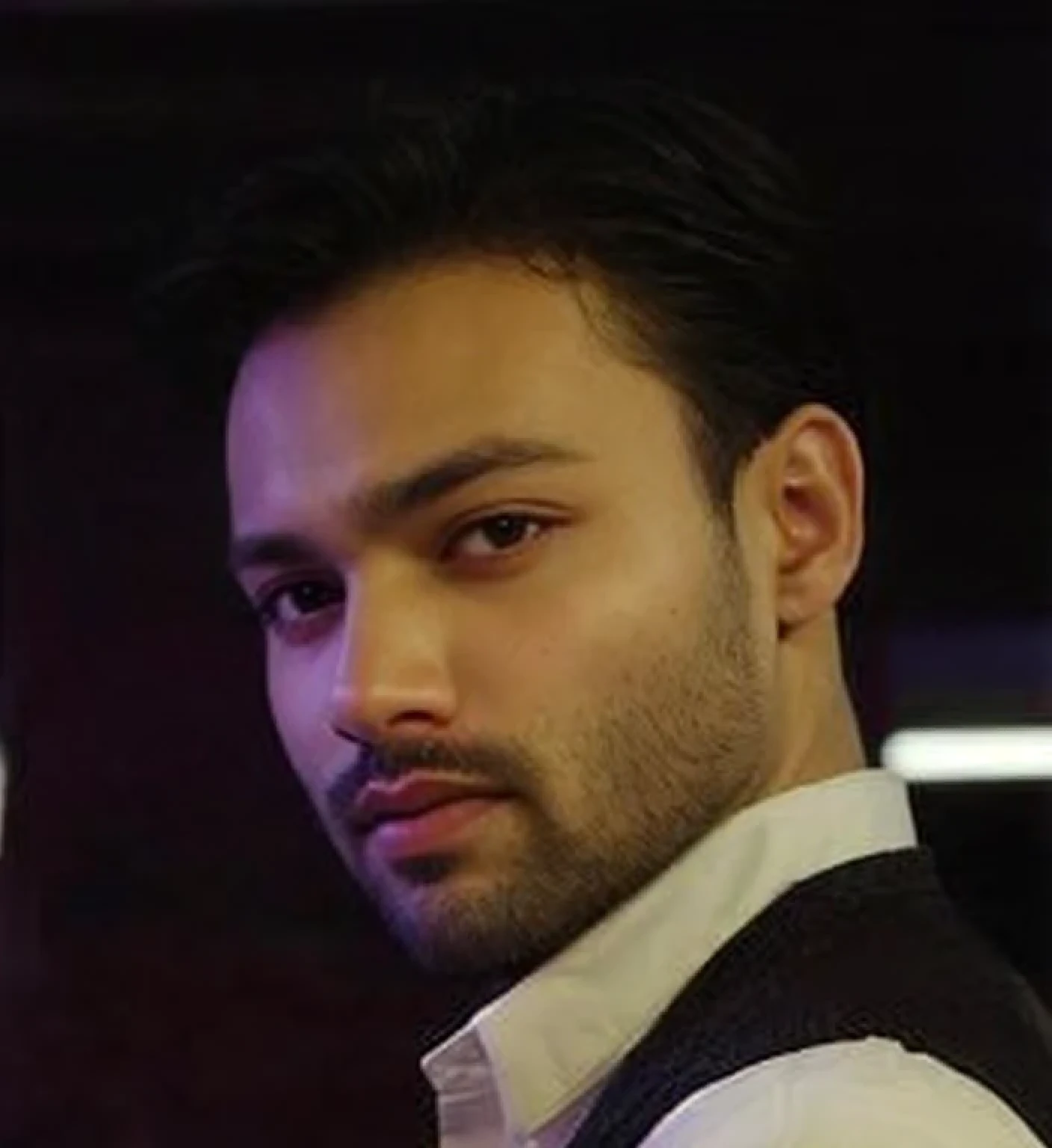 A beautiful young bearded man with highly detailed skin.