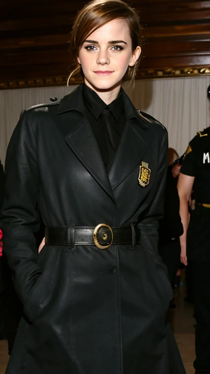 Emma Watson dressed in militia clothing with a sexy smile.