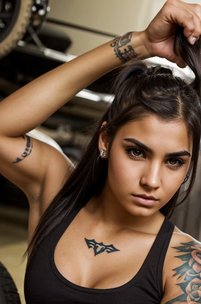 A tough-looking college-age girl with dark brown messy hair, and fair skin, has a nose piercing, an eyebrow piercing, three ear piercings in both ears, tattoos on her arm, and works as a mechanic