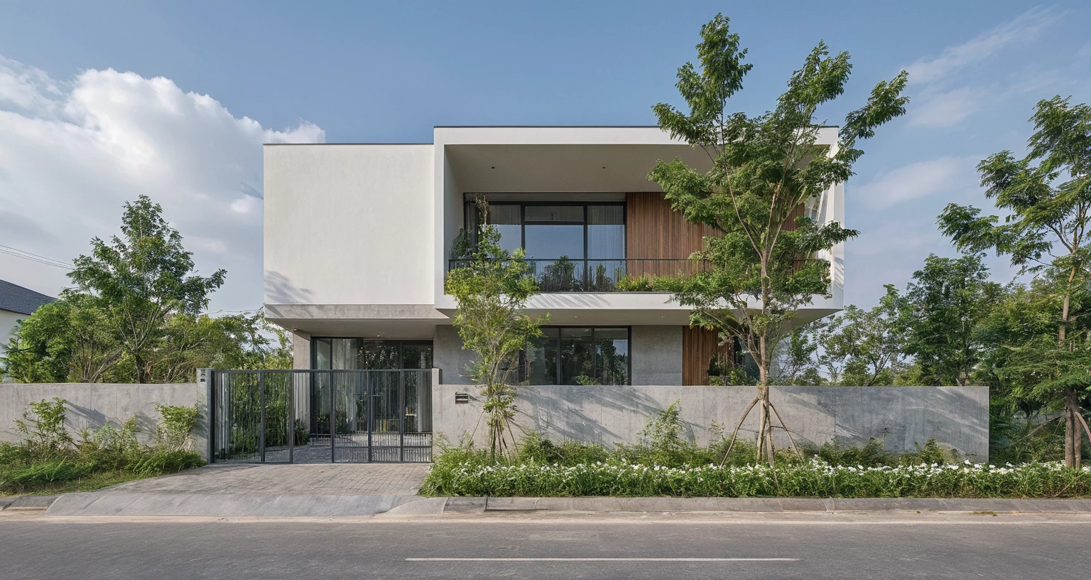 Raw photo, Masterpiece, high quality, best quality, authentic, high realistic, super detail, Realistic green tree exterior, outdoors, Tuonghoagio, house, modern stytle, on the street, wind flower wall, glass windows, GRAY STONE wall, GRAY metal gate, metal railing, house style modern on the street road, pavement, grass, trees, sky, cloud, (daylight:1.1)